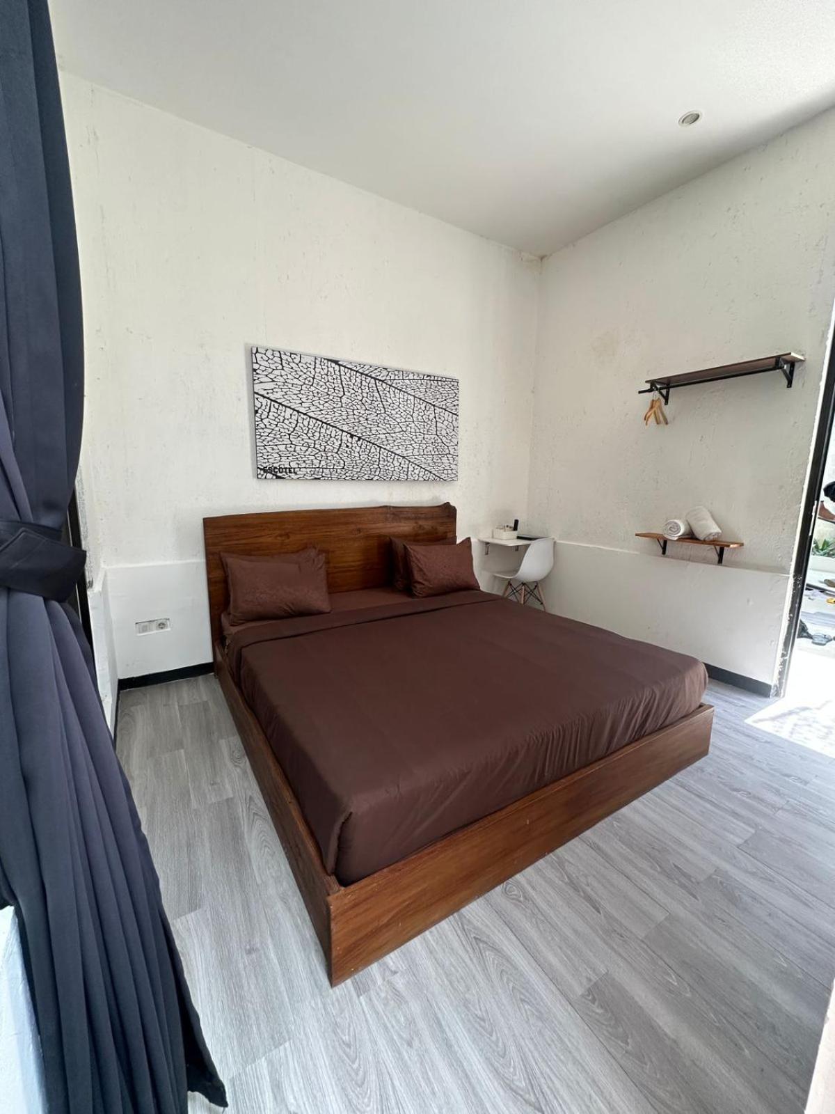 Escotel Tempekan Guest House Canggu Esterno foto